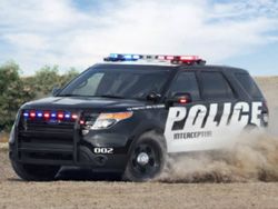 За полицейскими в США будут следить служебные авто