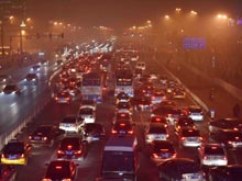 Пекинским водителям за четыре дня езды  в сильнейшем смоге  выписали  около  113 тысяч штрафов