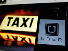 Uber  помирилась  с водителями  Калифорнии и Массачусетса: они не просятся   к ней в штат -    она   выплатит им  до 100 млн  долларов